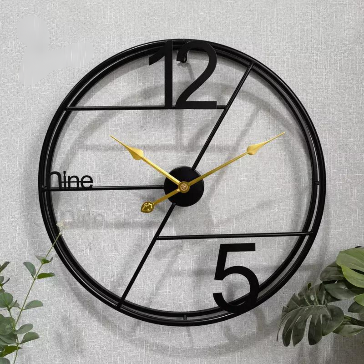 modern minimalist wall clock – black metal frame with gold hands for elegant home décor